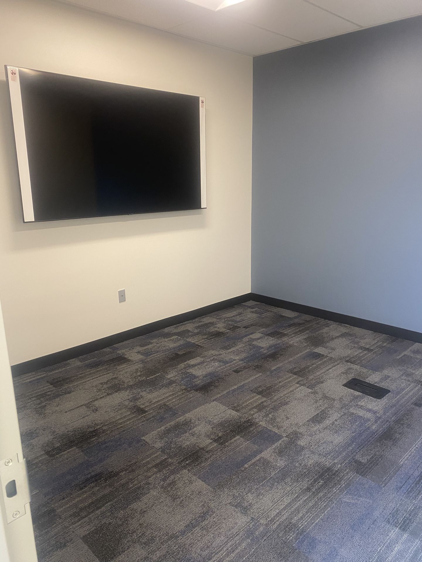Activity room with wall-mounted display